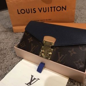 Louis Vuitton wallet with buckle